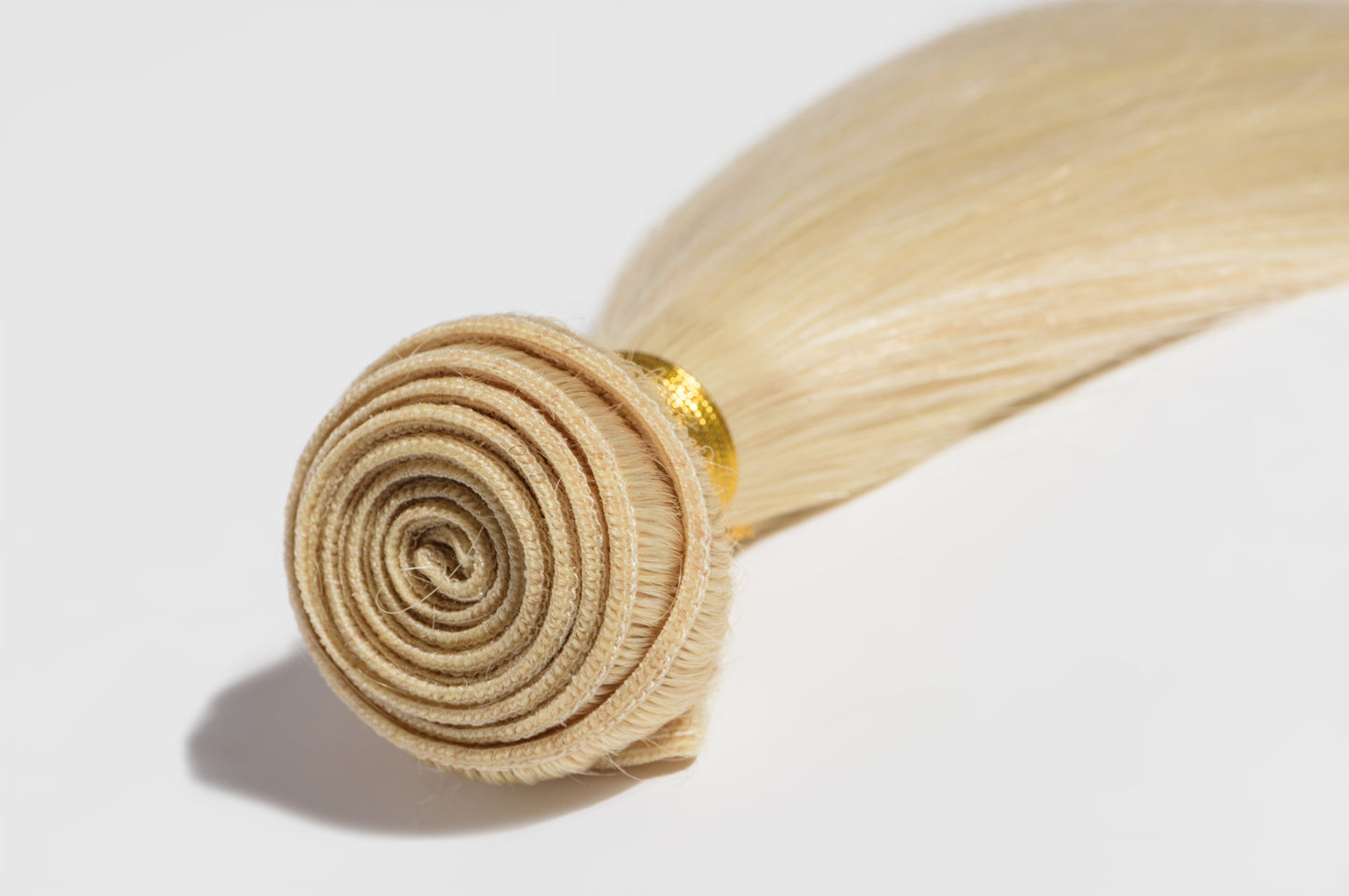 Premium Blonde Weft Bundles Made from Raw Hair.